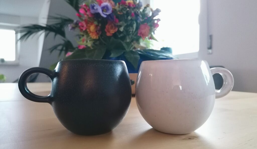 two cups - black and white
